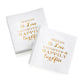 Two white napkins with gold text on a white background