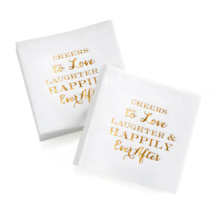 Two white napkins with gold text on a white background