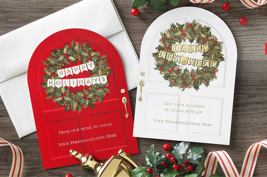 Two Christmas-themed greeting cards on a wooden surface with decorative elements.